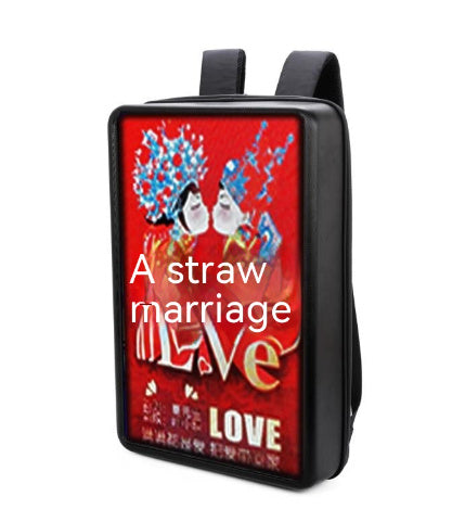 Backpack with a red design featuring two cartoon characters and text on a white background