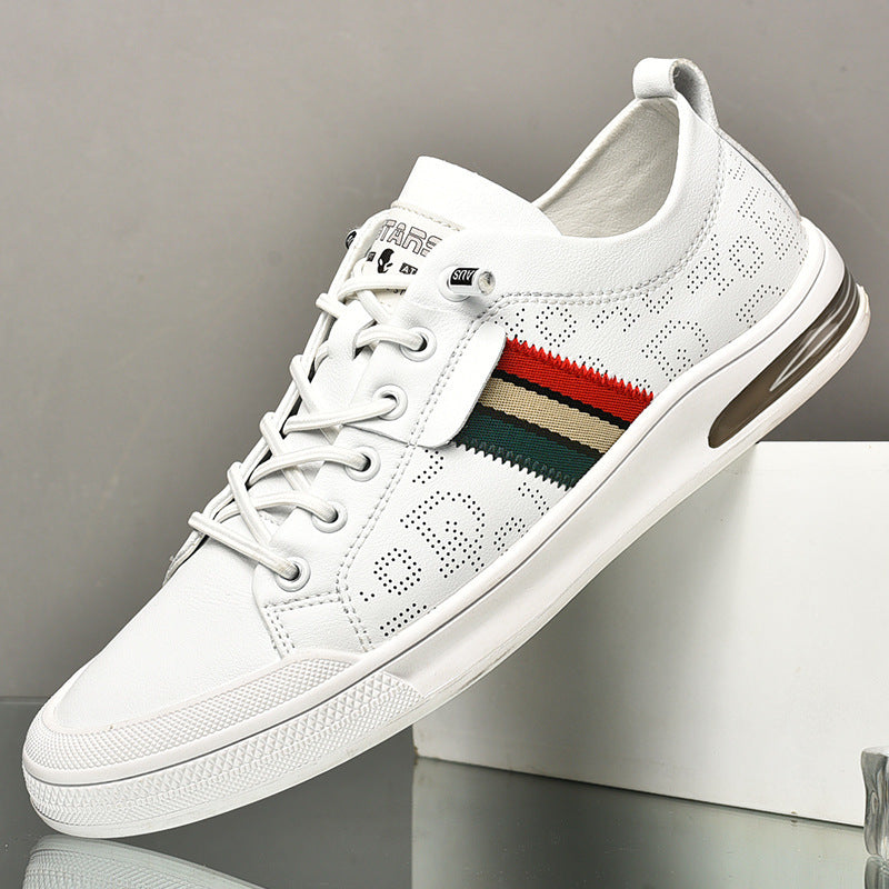 White sneaker with a colorful stripe on a gray background