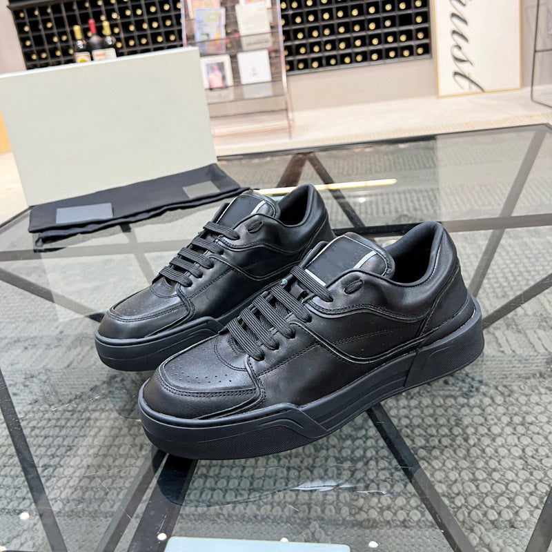 Black sneakers on a glass table with a blurred background