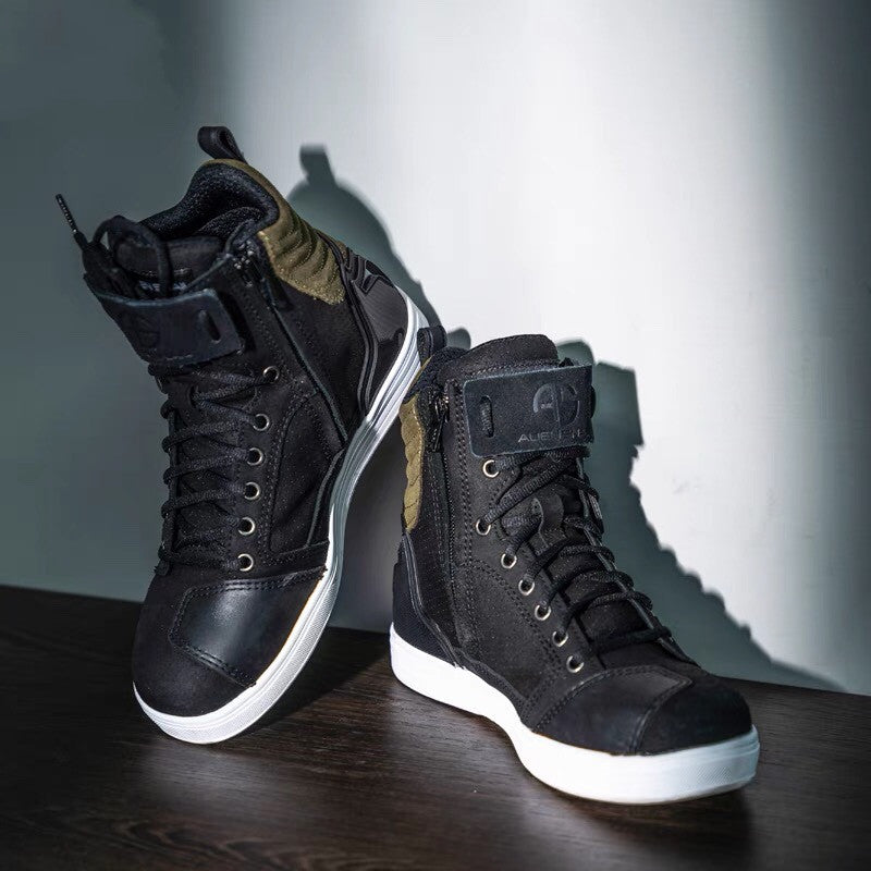 Black high-top sneakers with white soles on a dark surface