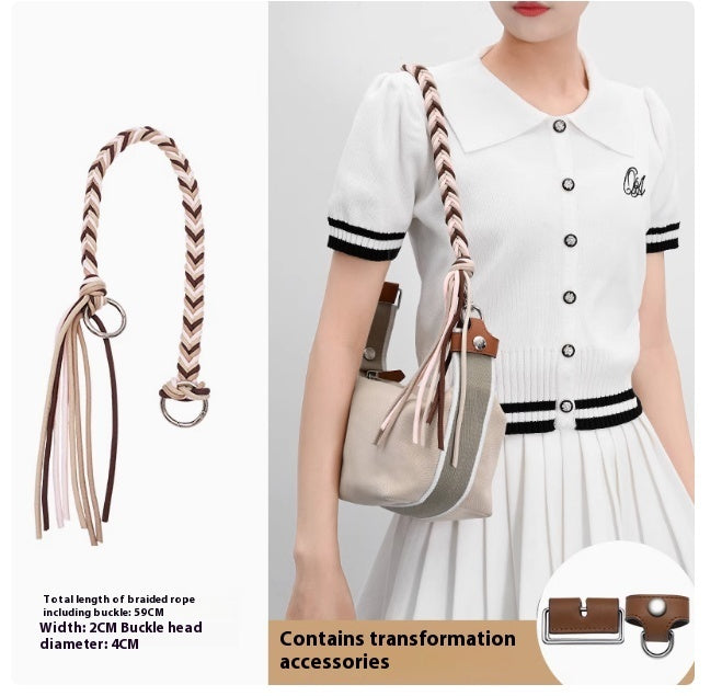Braided rope accessory with buckle, shown on a person wearing a white dress.