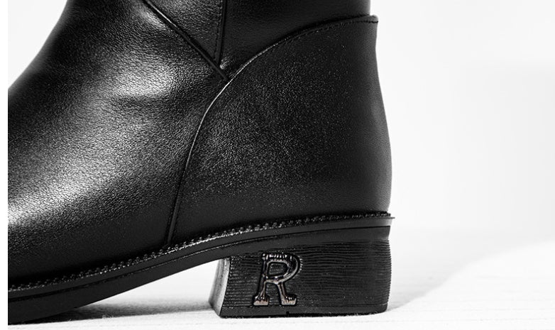Black leather boot with a brand logo on a white background