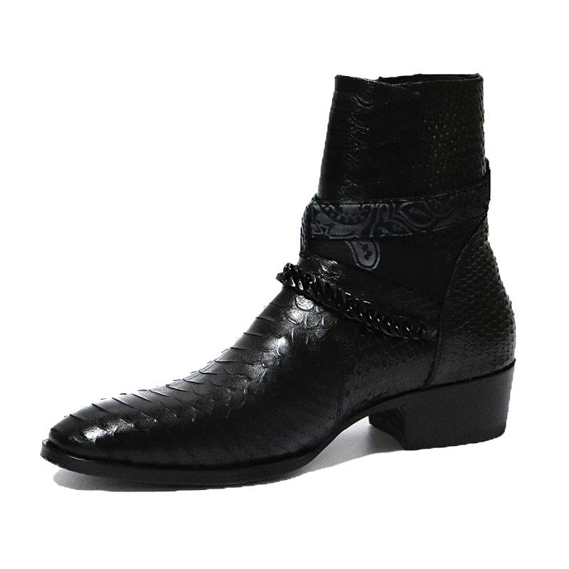 Black leather boot with decorative elements on a white background