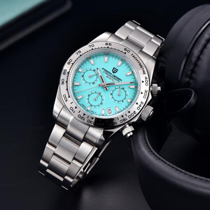 Silver watch with a turquoise dial on a dark background