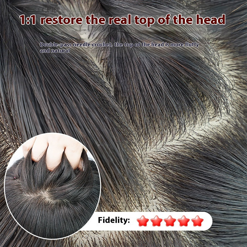 Close-up of hair extensions with a focus on the top of the head, showing texture and density.