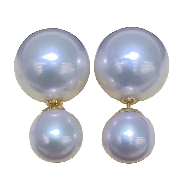 Pair of pearl earrings on a white background
