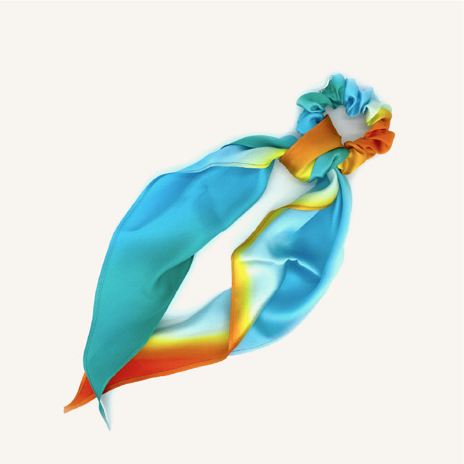 Colorful satin hair scarf with a scrunchie on a white background