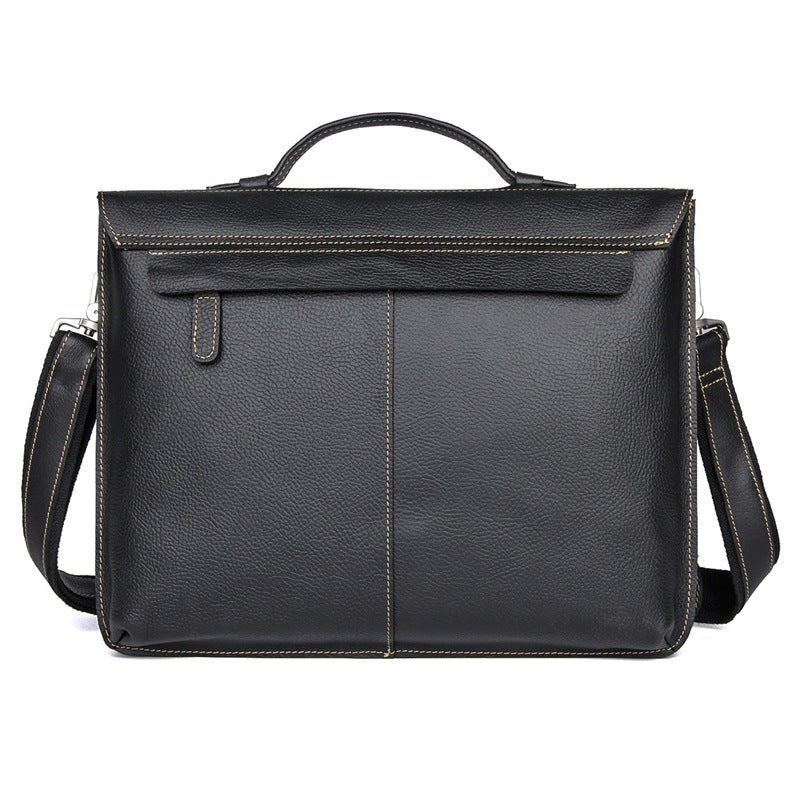 Black leather briefcase with shoulder strap on a white background