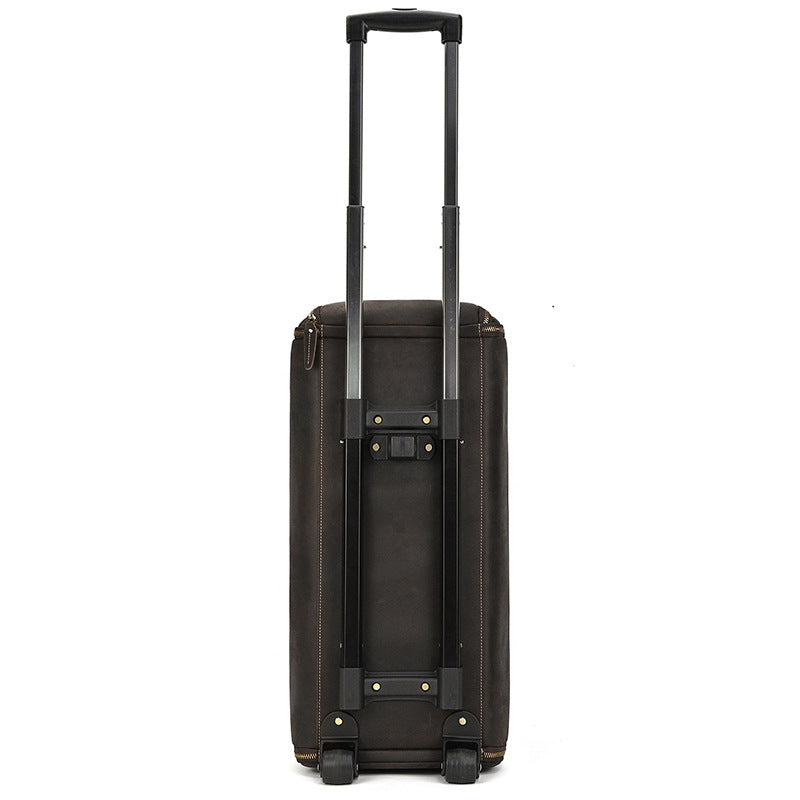 Black suitcase with wheels and handle on a white background