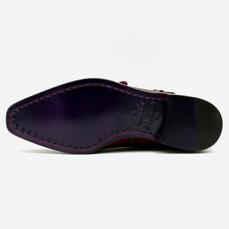 Close-up of a shoe sole with purple insole on a white background