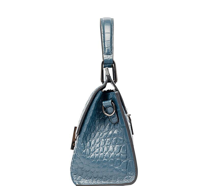 Blue textured handbag on a white background
