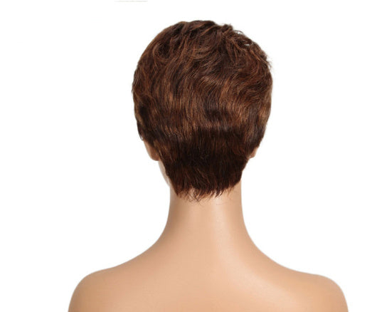 Mannequin head with a brown wig on a white background