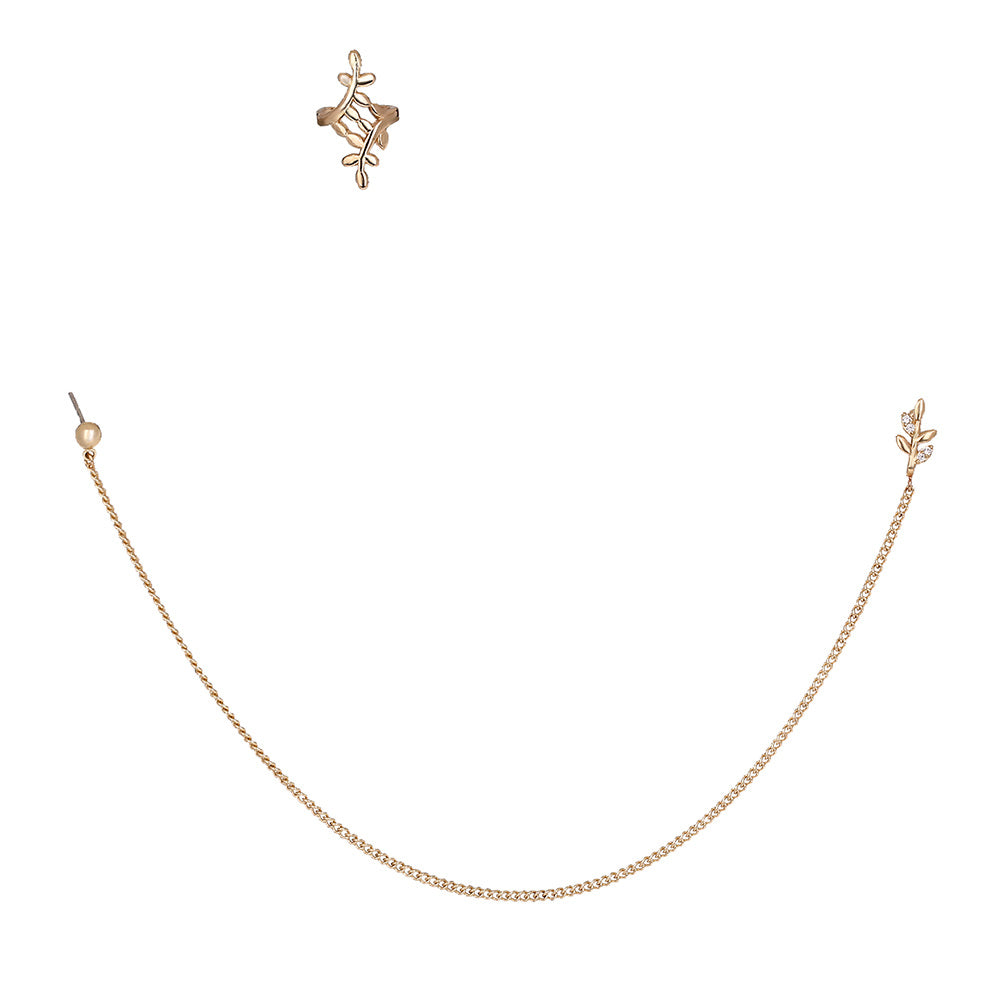 Gold necklace with matching earrings on a white background