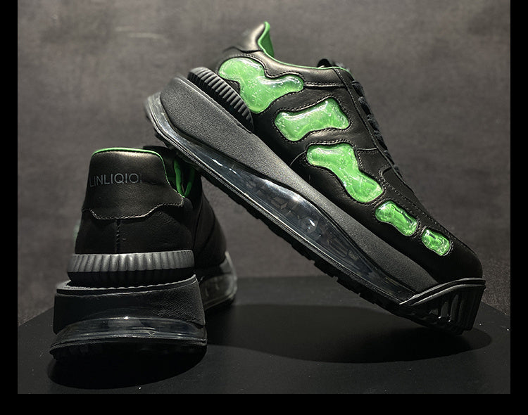 Black sneakers with green accents on a dark background