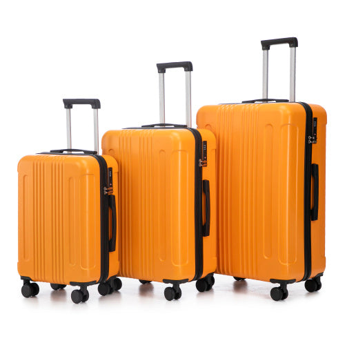 Set of three orange suitcases with black handles and wheels on a white background
