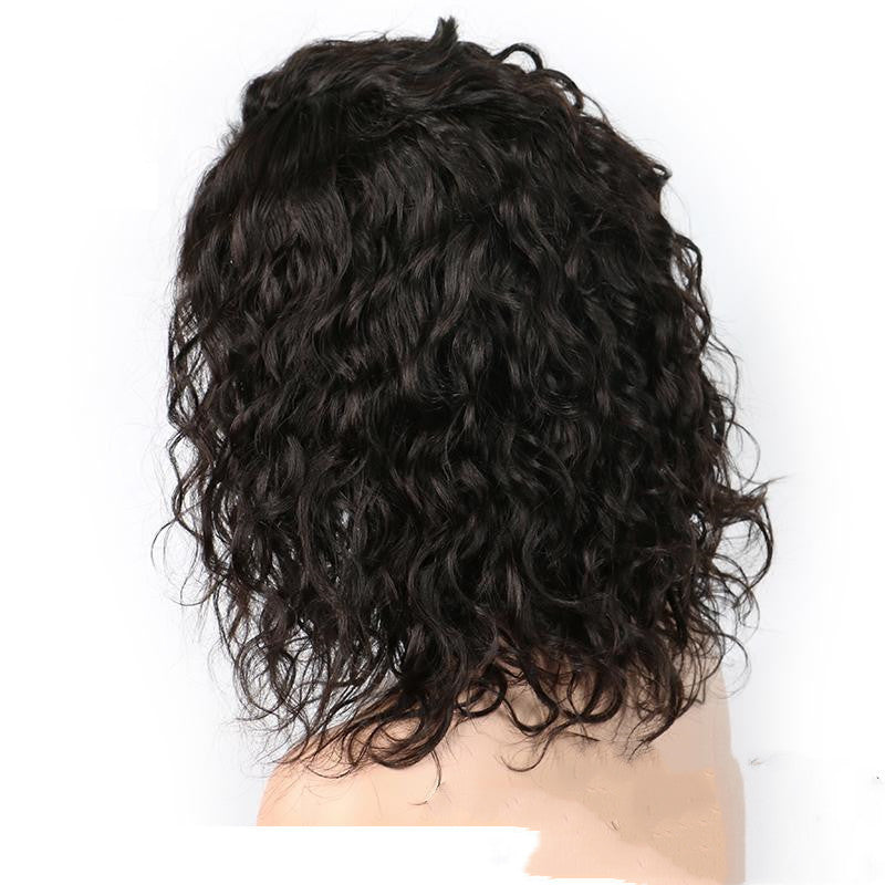 Black wavy wig on a mannequin head against a white background