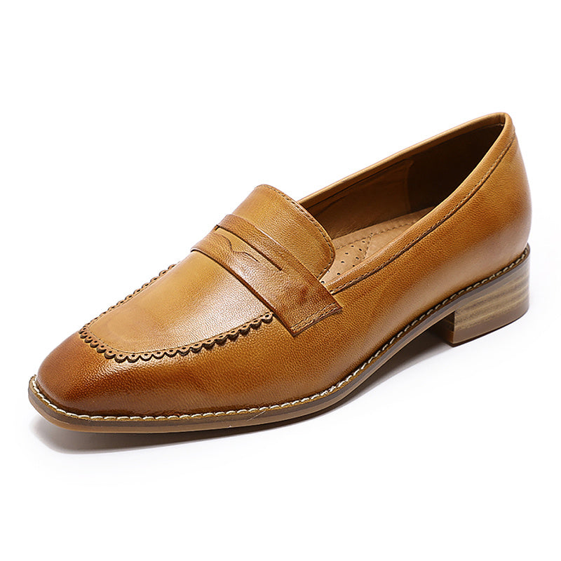 Brown leather loafer shoe on a white background