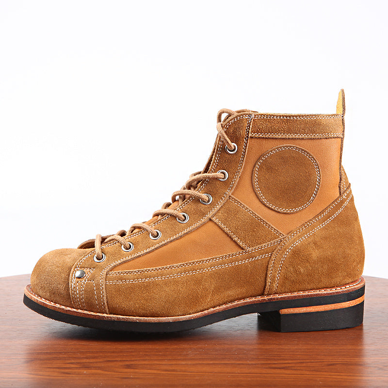 Brown leather boot on a wooden surface with a white background