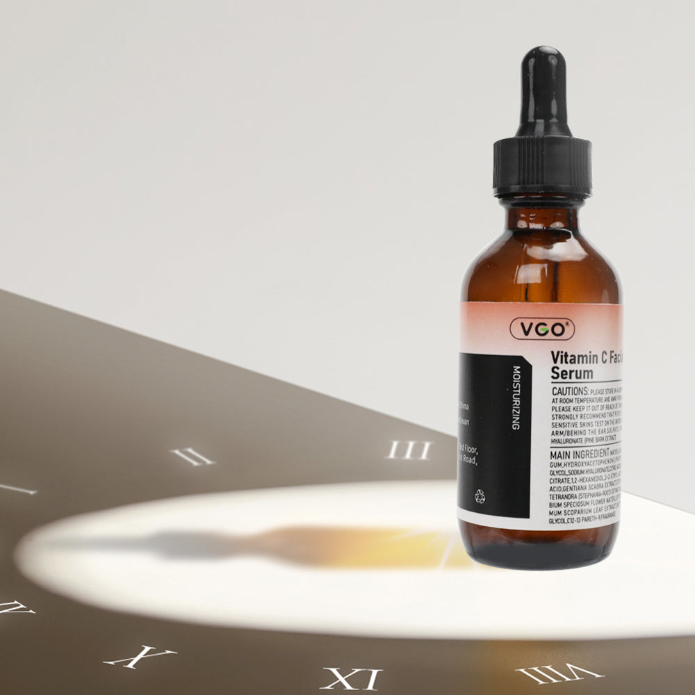 VCO Vitamin C Serum bottle on a reflective surface with a neutral background