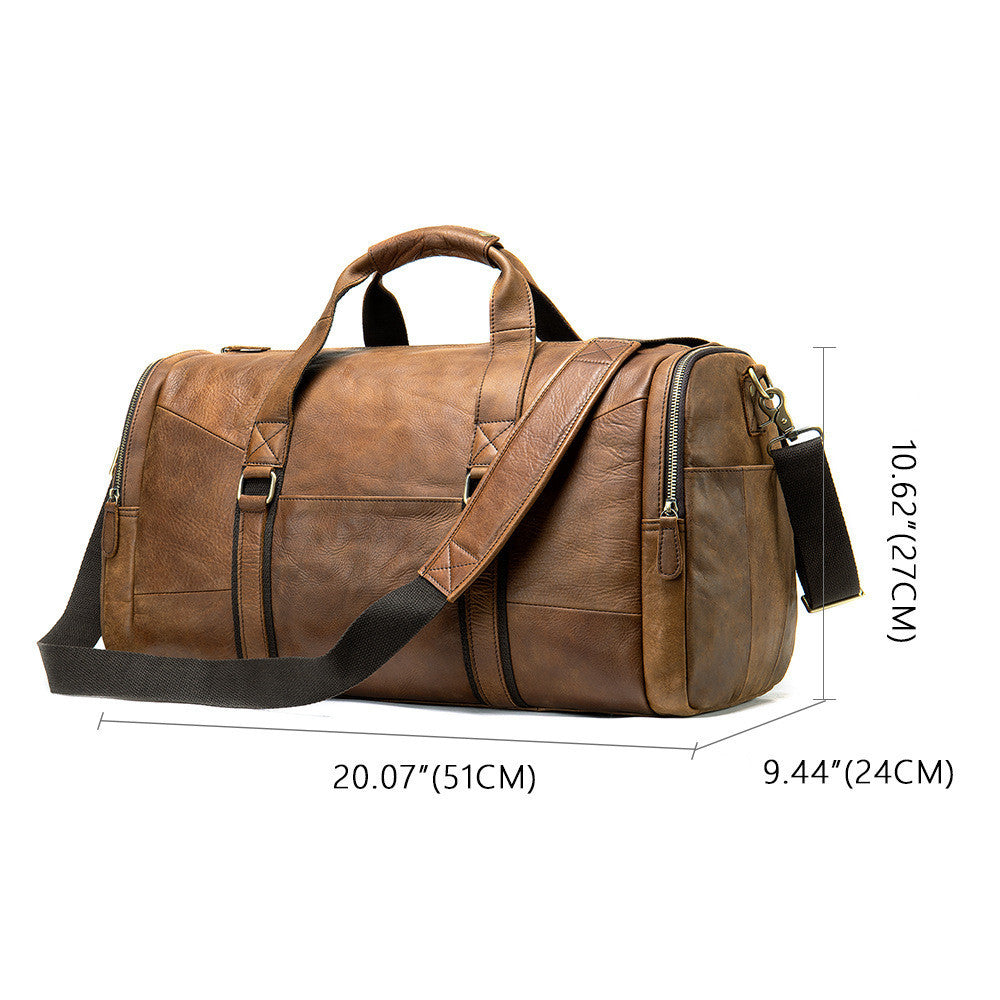 Brown leather duffel bag with measurements on a white background