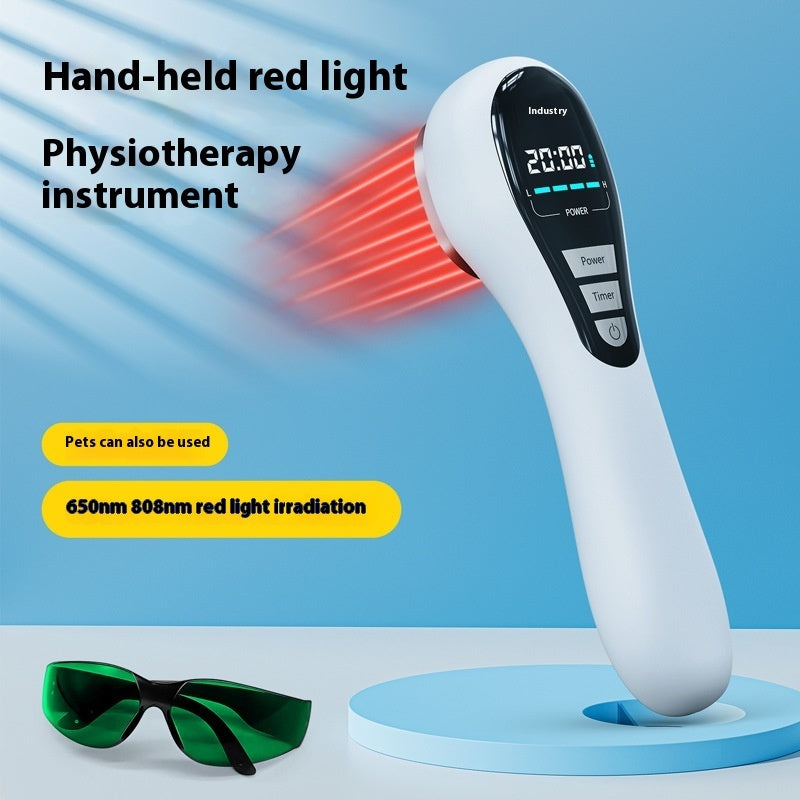 Hand-held red light physiotherapy instrument with digital display on a blue background