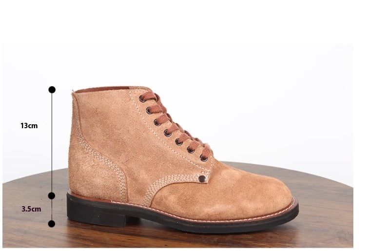 Tan leather boot on a wooden surface with measurements indicated.