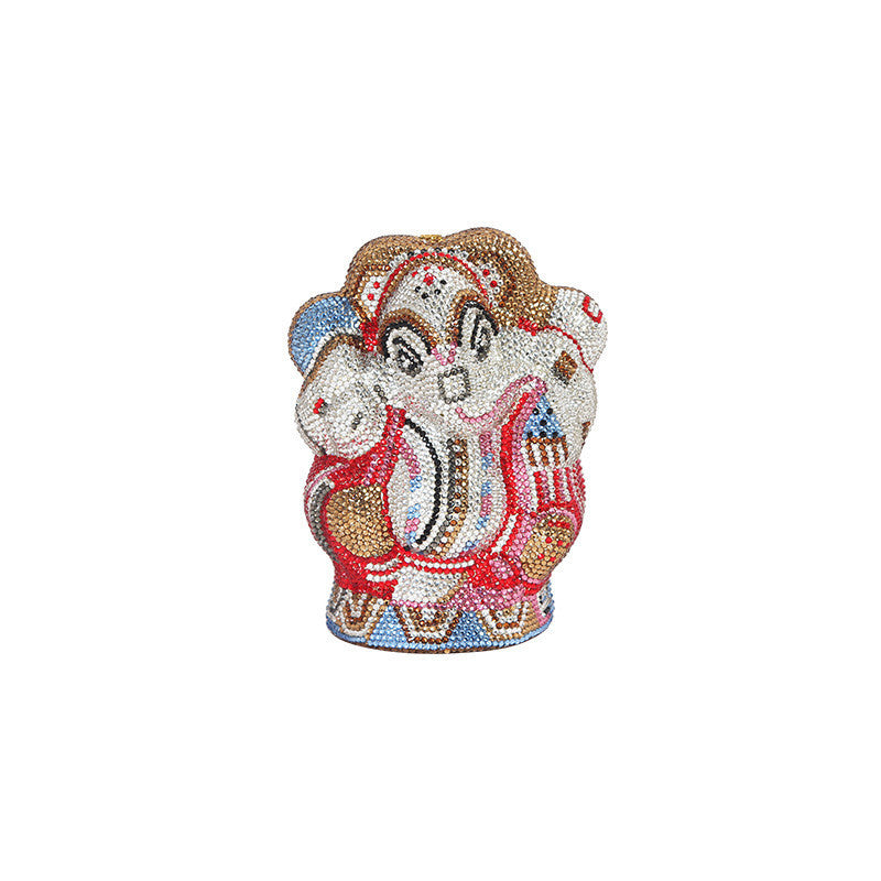 Decorative figurine of a character with a colorful outfit on a white background