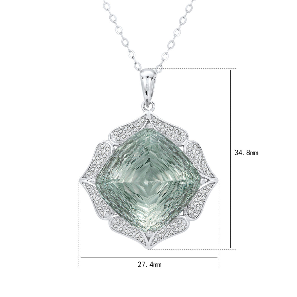 Green gemstone pendant with silver frame on a white background