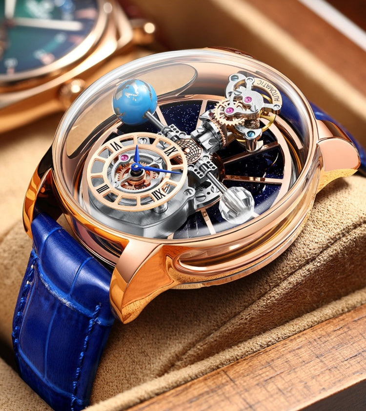 Luxury watch with blue leather strap and intricate design on a wooden surface