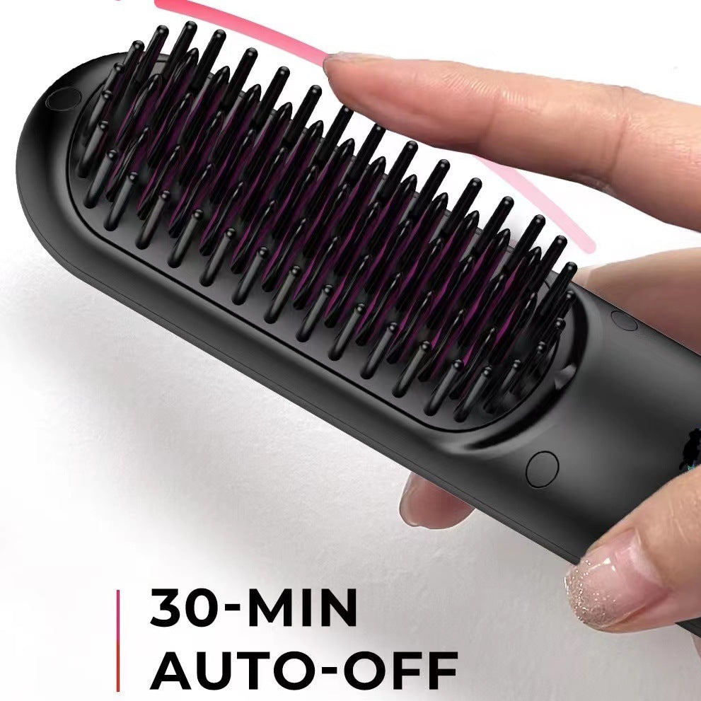 Hairbrush with 30-minute auto-off feature held by a hand on a white background