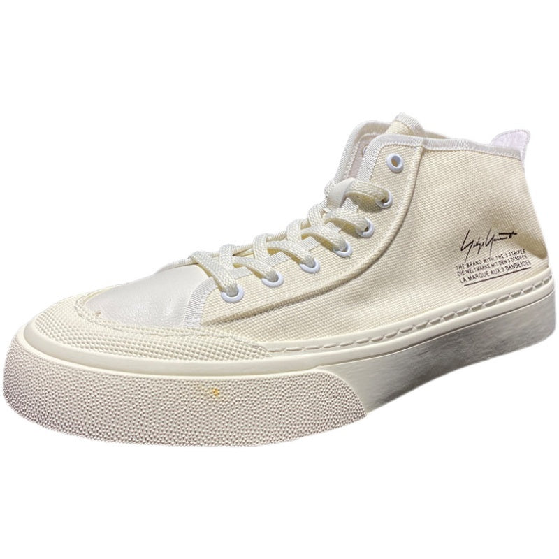 Beige high-top sneaker with white laces on a white background