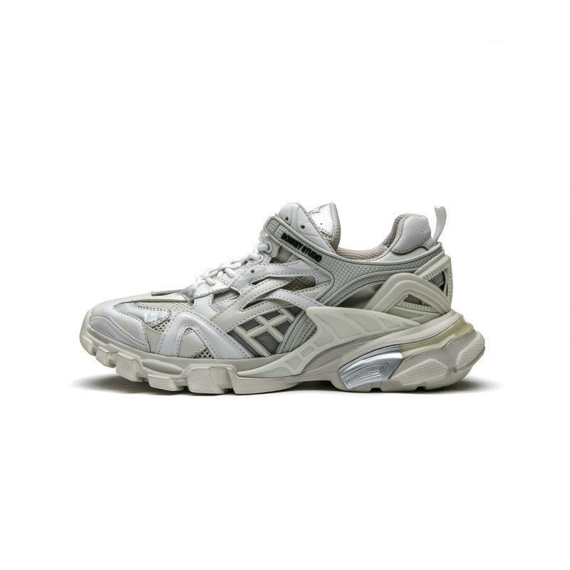 White sneaker with gray accents on a white background