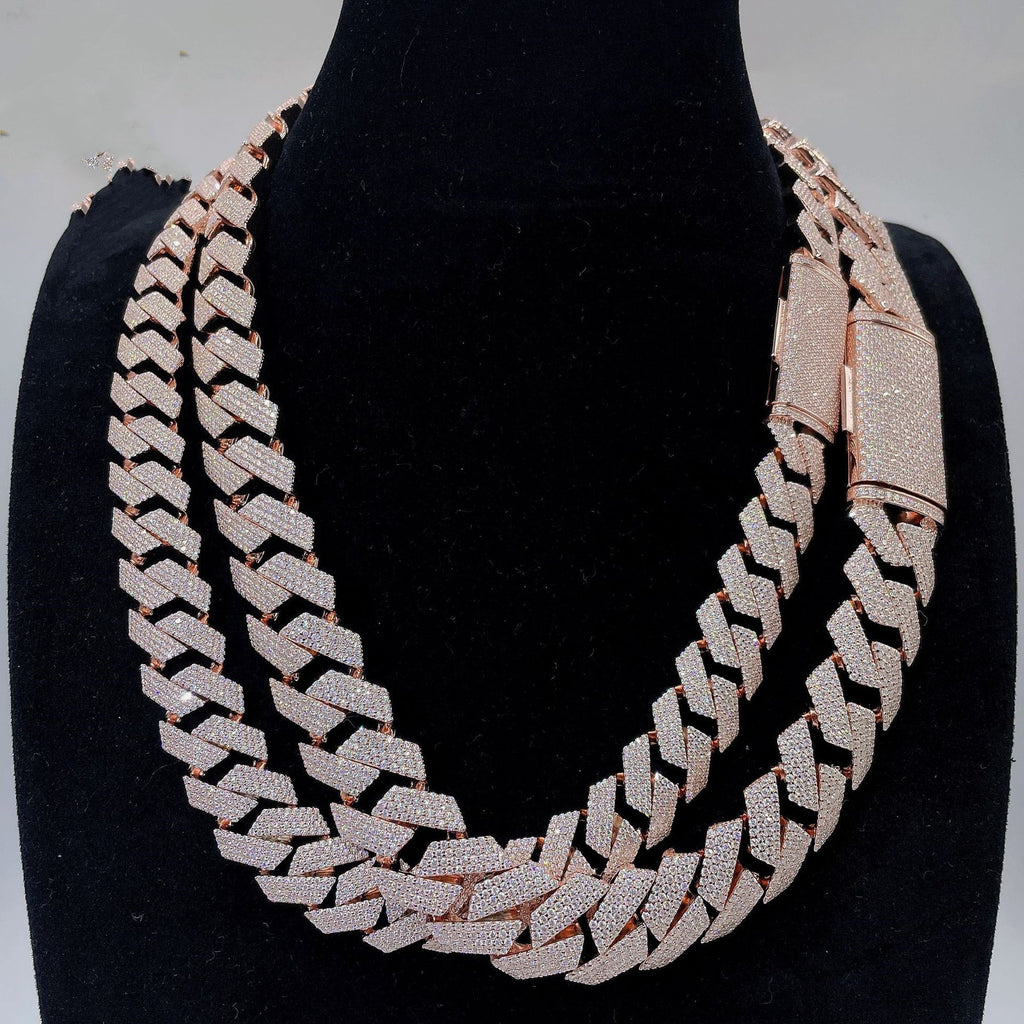 Rose gold chain necklace on a black mannequin bust