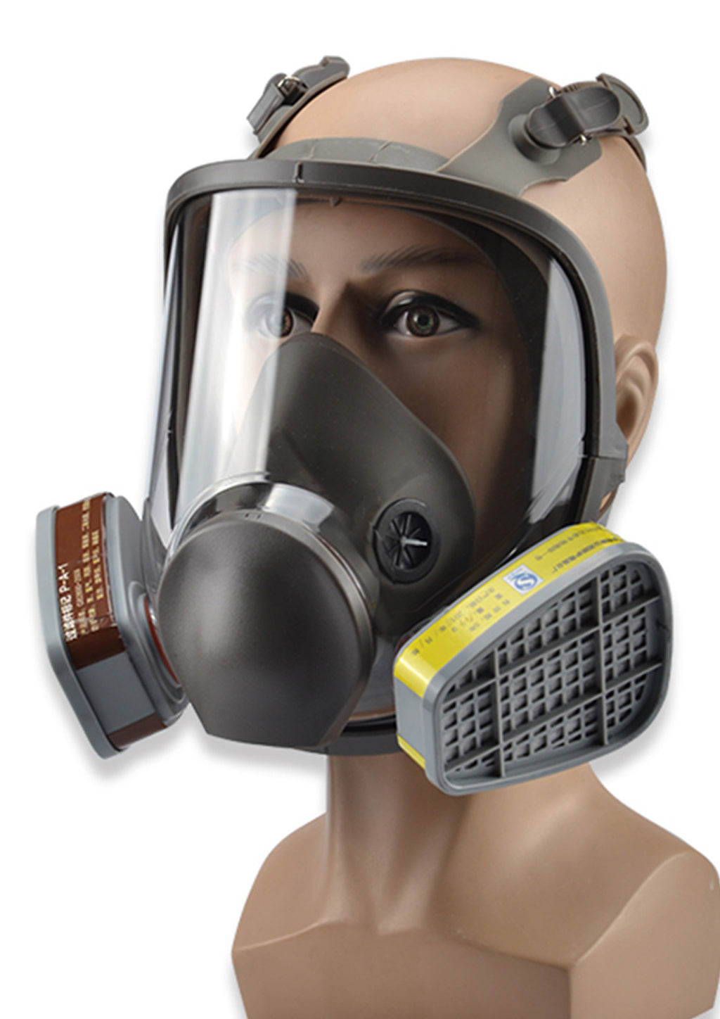 Full-face respirator mask on a mannequin head with filter cartridge attached