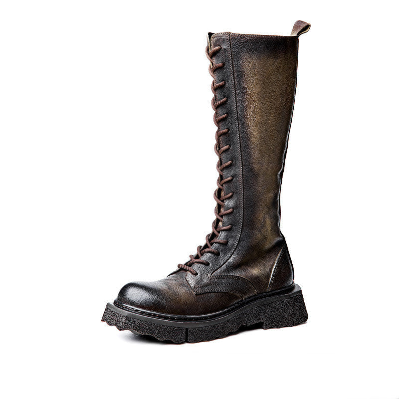 Brown leather boot with lace-up design on a white background