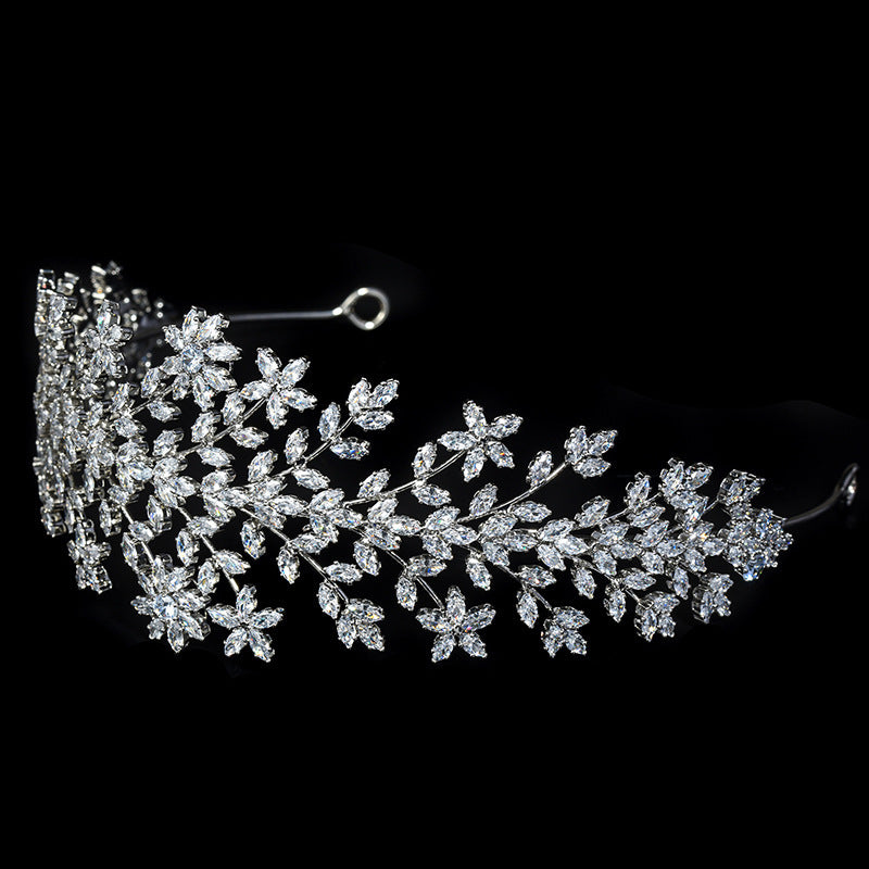 Silver floral hairpiece on a black background