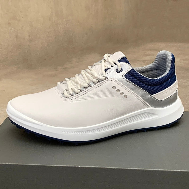 White sneaker with blue accents on a gray surface