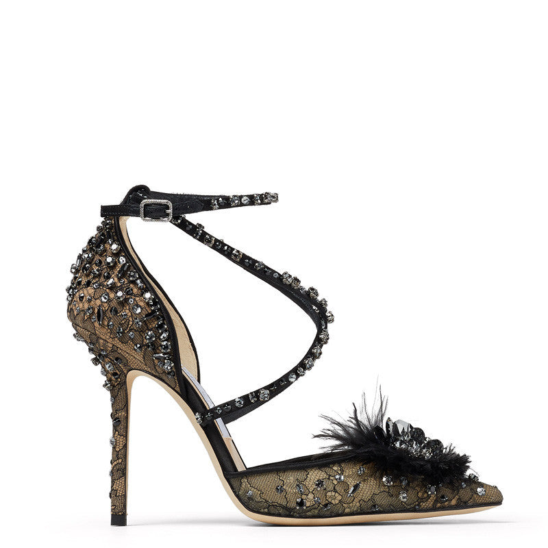 Elegant black high-heeled shoe with lace and feather details on a white background