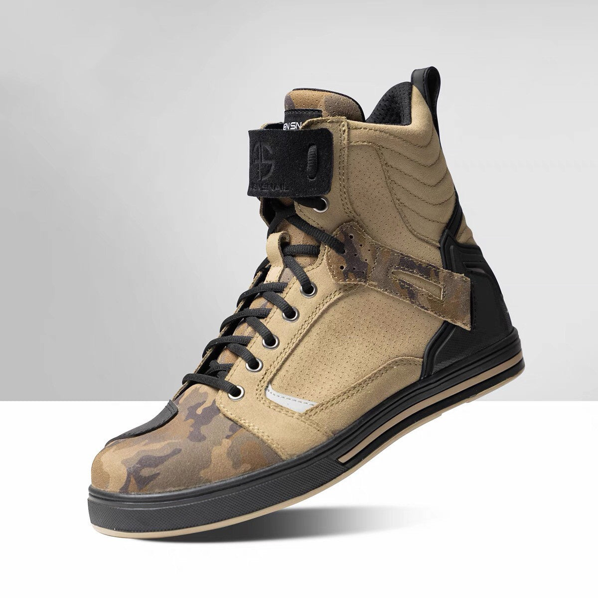 Tan high-top sneaker with black accents on a light gray background