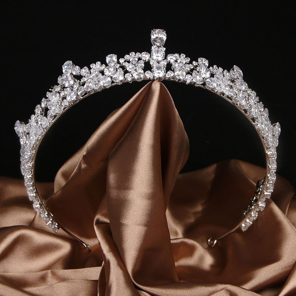 Diamond tiara on a brown fabric background
