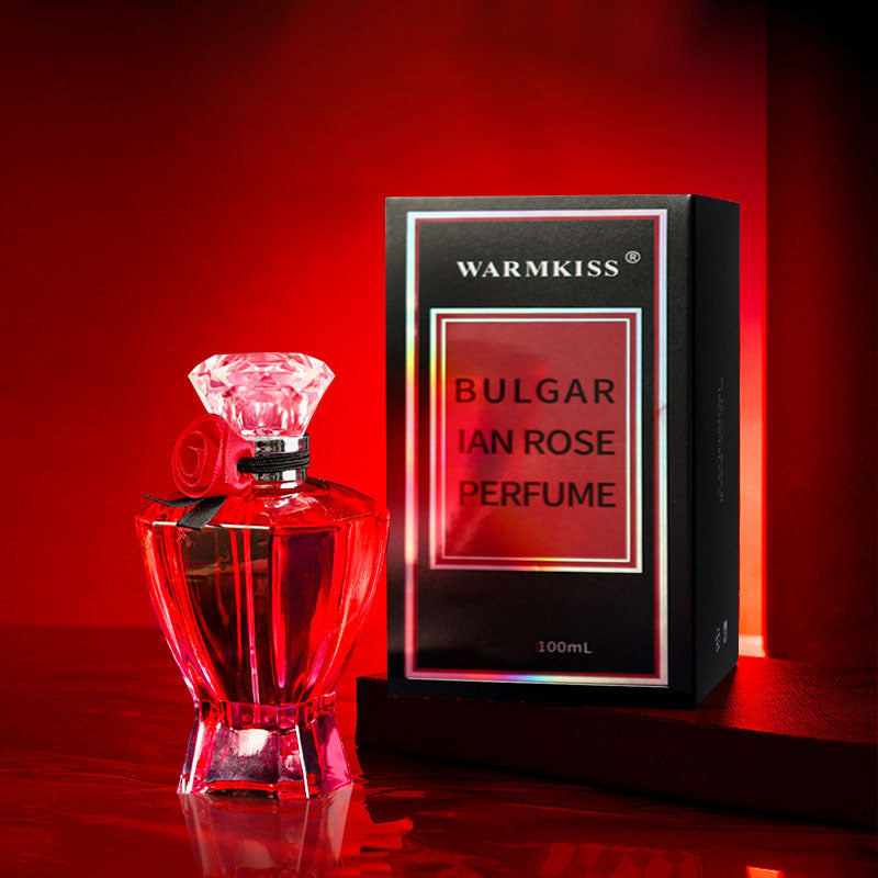 Bulgarian Rose perfume bottle and packaging on a red background