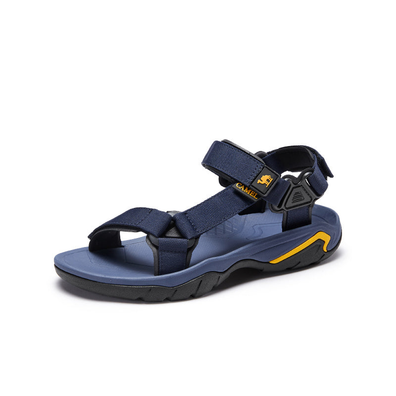Blue sandal with black and yellow accents on a white background