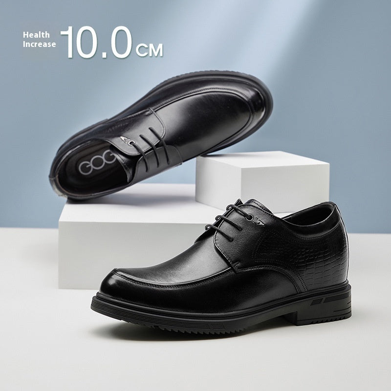Black dress shoes on a white platform with a blue gradient background