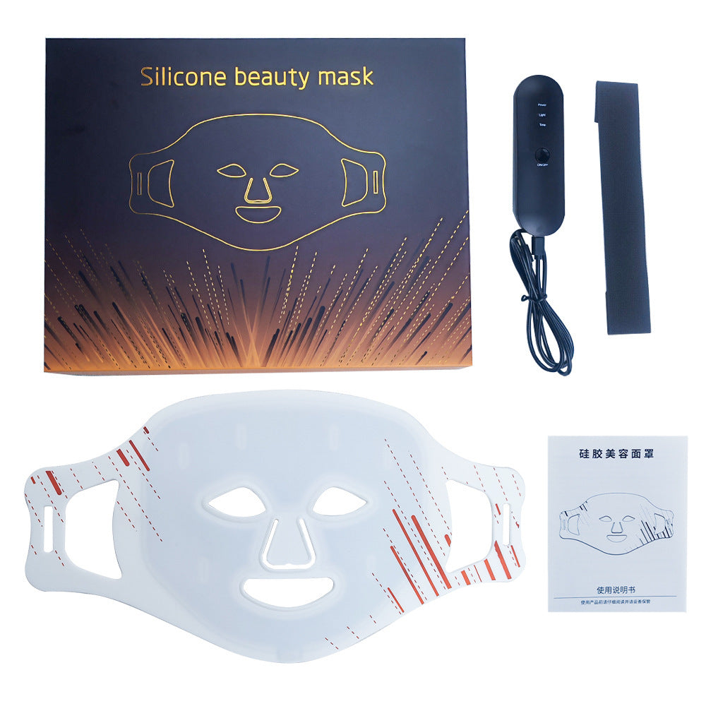 Silicone beauty mask with packaging, power adapter, and user manual on a white background