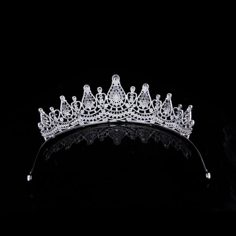 Silver tiara on a black background