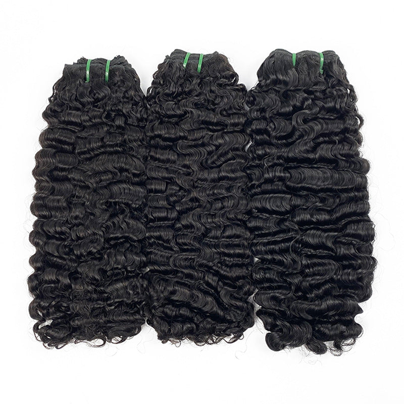 Three bundles of curly hair extensions on a white background