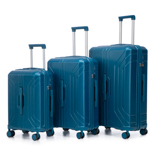 Set of three blue suitcases of different sizes on a white background