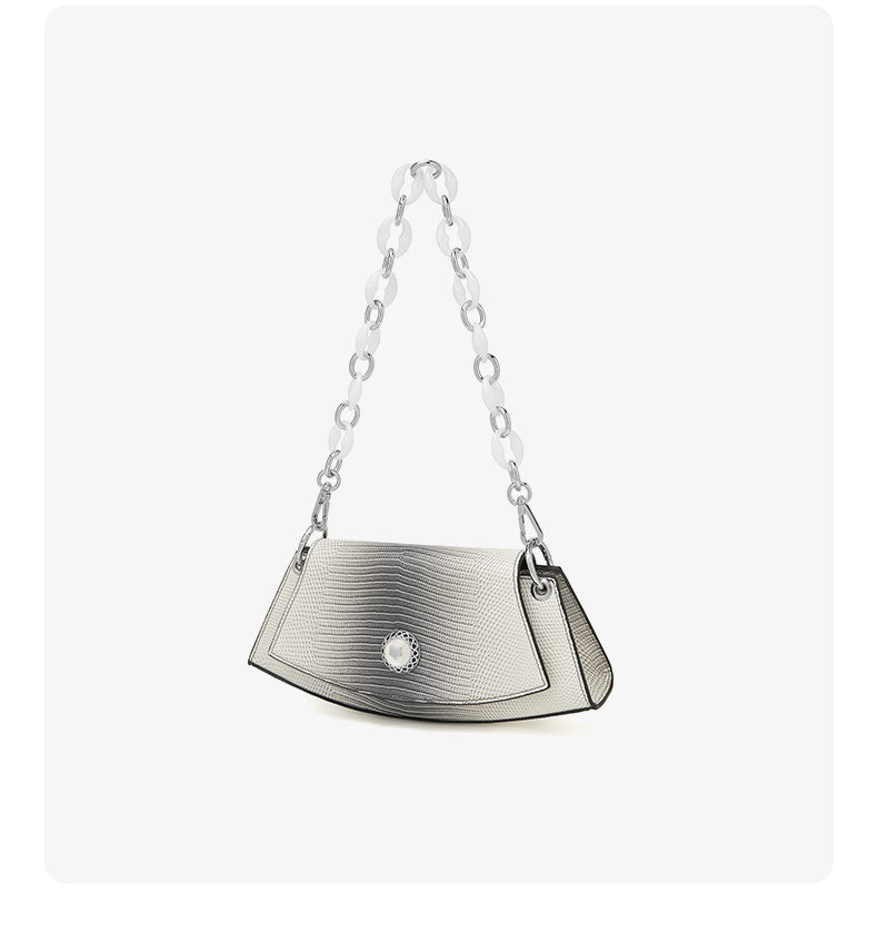 Silver handbag with chain strap on a white background