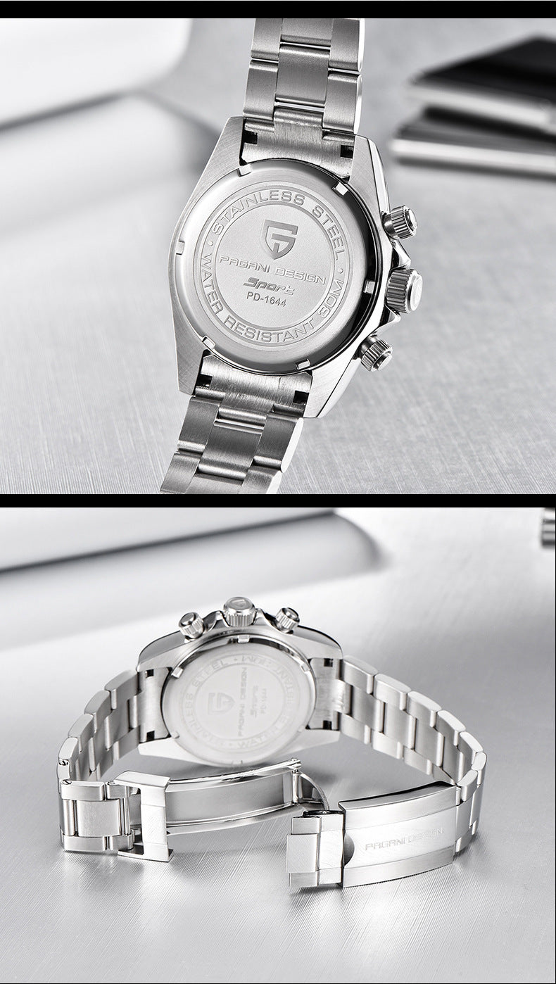 Silver watch with detailed face and metal band on a light gray surface