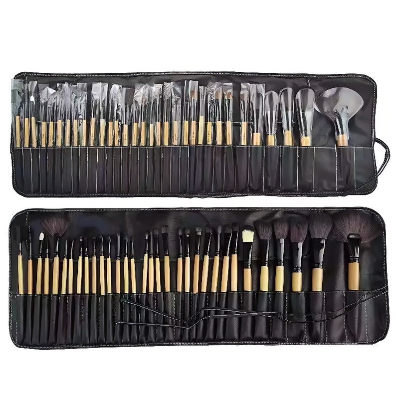 Set of makeup brushes in a black case on a white background